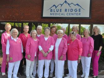News Observer photo The Pink Ladies at Blue Ridge Medical Center were honored last week for a combined 26 years of volunteer service at the hospital. In front of Blue Ridge Medical Center before the Hospital Authority’s quarterly meeting are, from left, front, Shirley Copeland, Pat Quinn, Barbara Cheatham, Laura Haight, and Wanda Patterson; and, back, Louiza Whittaker, Maureen Dalziel, Jean Bonnewitz, Rita Oberle, Carole Thomas, Becky Guthrie, Joyce Mitchell, and Susan Kiker.