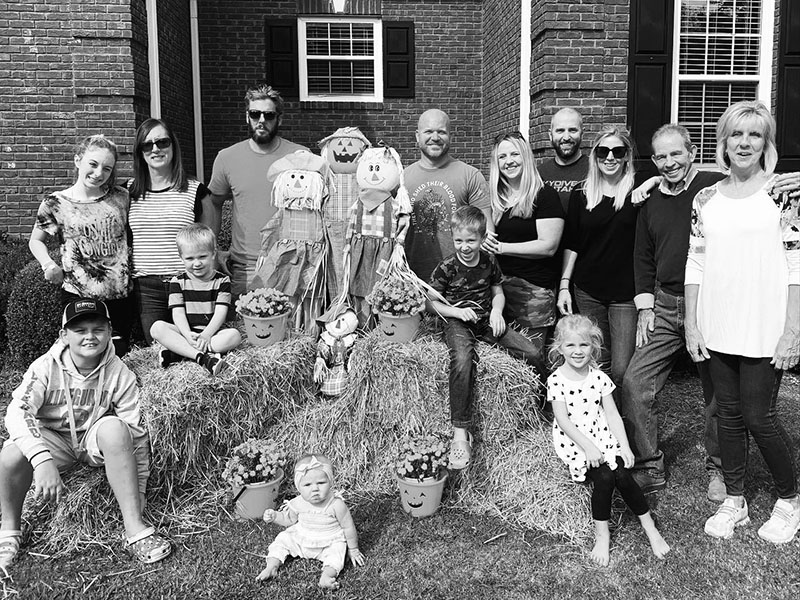 Rick and Sherry Thacker have three grown children and, to date, six grandchildren. Shown are, left, front, Banks Thacker, Beckett Laggis, Everett Stover and Georgia Grace Stover; sitting on the grass, Korey Laggis; back row, Berkeley Thacker, Carrie Thacker, Brandon Thacker, Chris Laggis, Whitney Laggis, Jonathan Stover, Lauren Stover, Rick Thacker and Sherry Thacker. 