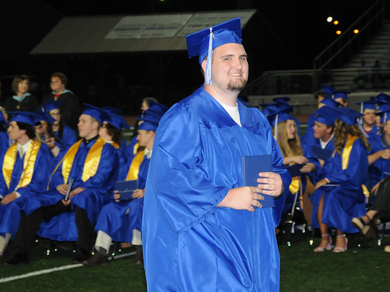Justin McDaniel was all smiles but wasn’t letting go of his diploma at the Fannin High graduation ceremonies.  