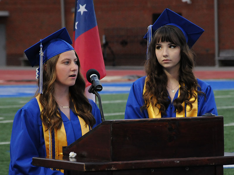 Raven Porter, left, and Kathryn Young opened graduation with a welcome and introduction of guests.